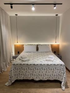 Cama ou camas em um quarto em Verona Parque Hotel