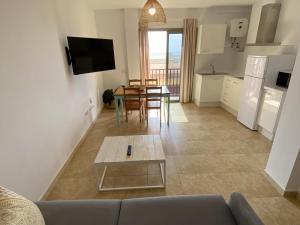 Kuchyň nebo kuchyňský kout v ubytování Vivienda vacacional sur de europa b 3 3