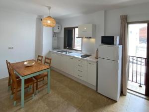 Kuchyň nebo kuchyňský kout v ubytování Vivienda vacacional sur de europa b 3 5