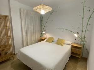 Postel nebo postele na pokoji v ubytování Vivienda vacacional sur de europa b 3 5