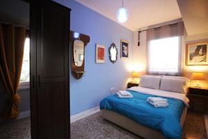 Posteľ alebo postele v izbe v ubytovaní Vintage Apartment