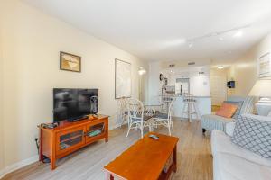 Μια τηλεόραση ή/και κέντρο ψυχαγωγίας στο Bay Creek Villa - 205