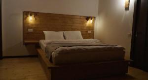 Letto o letti in una camera di Mansarda Kazbegi