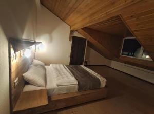 Letto o letti in una camera di Mansarda Kazbegi