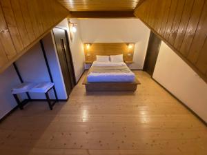 Letto o letti in una camera di Mansarda Kazbegi