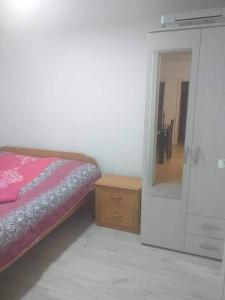 Ένα ή περισσότερα κρεβάτια σε δωμάτιο στο Apartmani Grza