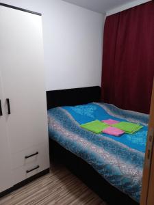Postel nebo postele na pokoji v ubytování Apartmani Grza + 37 fotografií