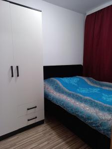 Postel nebo postele na pokoji v ubytování Apartmani Grza
