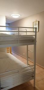 a couple of bunk beds in a room at Presqu'île de Chooz in Chooz