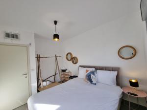 En eller flere senge i et værelse på Casa 2 Mitzpe Ramon