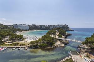 an aerial view of a beach with boats in the water at ARTIEM Audax - Adults Only in Cala Galdana