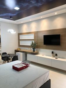 Televisyen dan/atau pusat hiburan di Lotu's Motel +12 gambar