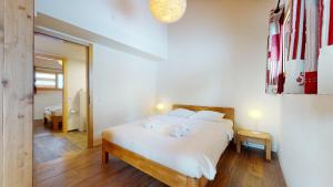 Voodi või voodid majutusasutuse Modern chalet surrounded by nature in Vercorin toas