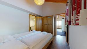 Voodi või voodid majutusasutuse Modern chalet surrounded by nature in Vercorin toas