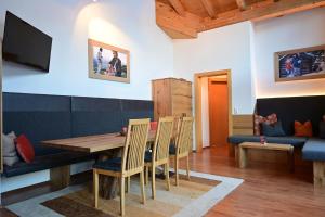 Telewizja i/lub zestaw kina domowego w obiekcie Residence Martha