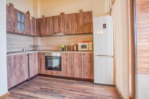 Кухня или кухненски бокс в Lovely 2BD Maisonette in Bansko