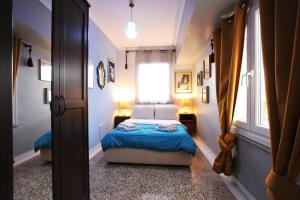 Posteľ alebo postele v izbe v ubytovaní Vintage Apartment