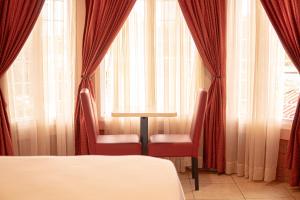 Orquidea Limon Hotel Boutique房間的床