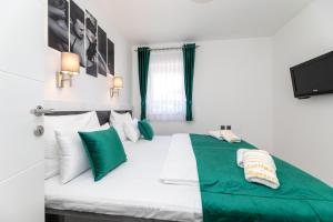 Posteľ alebo postele v izbe v ubytovaní Apartman 1 Paola