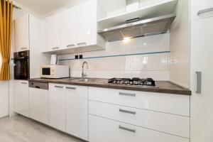 Kuchyňa alebo kuchynka v ubytovaní Apartman 1 Paola