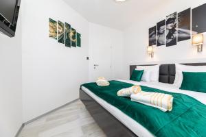 Posteľ alebo postele v izbe v ubytovaní Apartman 1 Paola