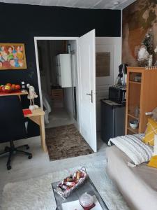Kuchyň nebo kuchyňský kout v ubytování Demeure Prosper 1 chambre d'hôte privative avec petit déjeuner compris