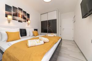 Posteľ alebo postele v izbe v ubytovaní Apartman 1 Paola
