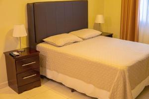 Orquidea Limon Hotel Boutique房間的床