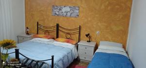 Postel nebo postele na pokoji v ubytování La Piccola Siesta b&b