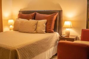 Orquidea Limon Hotel Boutique房間的床