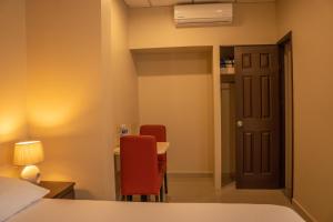 Orquidea Limon Hotel Boutique房間的床