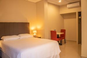 Orquidea Limon Hotel Boutique房間的床