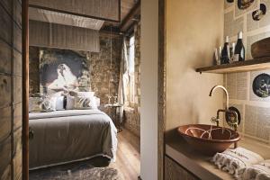 Voodi või voodid majutusasutuse Area Synest Nature Suites toas