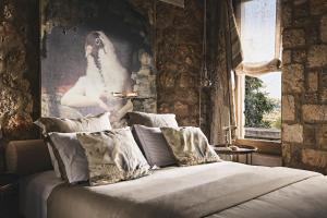Voodi või voodid majutusasutuse Area Synest Nature Suites toas