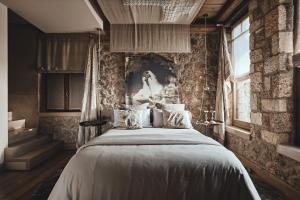 Voodi või voodid majutusasutuse Area Synest Nature Suites toas