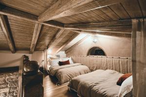 Voodi või voodid majutusasutuse Area Synest Nature Suites toas