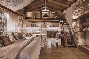 Voodi või voodid majutusasutuse Area Synest Nature Suites toas