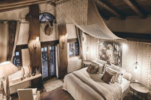 Voodi või voodid majutusasutuse Area Synest Nature Suites toas