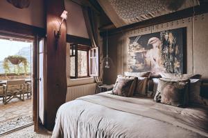 Voodi või voodid majutusasutuse Area Synest Nature Suites toas