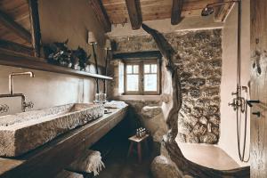 Vannituba majutusasutuses Area Synest Nature Suites