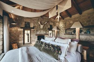 Voodi või voodid majutusasutuse Area Synest Nature Suites toas