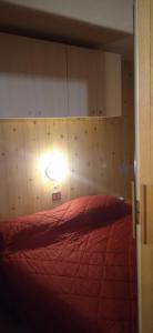 Postel nebo postele na pokoji v ubytování Lago Rotondo Ski House