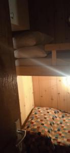 Postel nebo postele na pokoji v ubytování Lago Rotondo Ski House