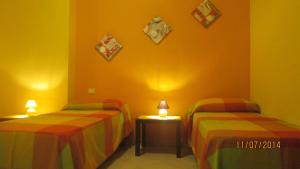 Postel nebo postele na pokoji v ubytování Bed & Breakfast Valeri