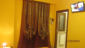 TV a/nebo společenská místnost v ubytování Bed & Breakfast Valeri