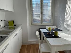 A kitchen or kitchenette at Appartamento bomboniera via Marghera 37