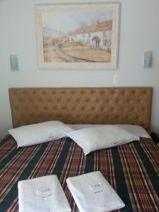Un ou plusieurs lits dans un hébergement de l'établissement Hotel Pousada Valintur