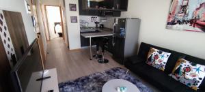 Kuchyň nebo kuchyňský kout v ubytování APART HOTEL EN BULNES