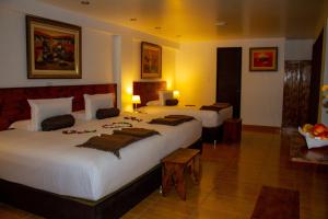 Voodi või voodid majutusasutuse Hotel Tara Machupicchu toas