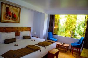 Voodi või voodid majutusasutuse Hotel Tara Machupicchu toas